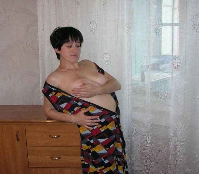 Housewife showed that she had beneath light dressing gown 11 photo