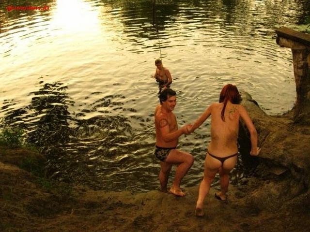 Slender nudists bathing naked on the beach 2 photo