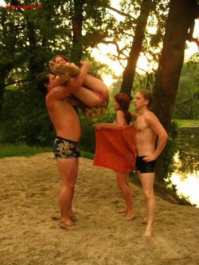 Slender nudists bathing naked on the beach 5 photo