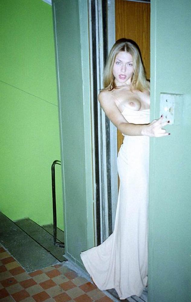 Long-legged whores posing in stairwell 14 photo