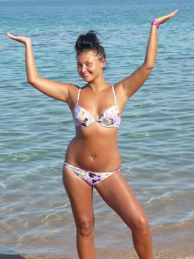 Young girl with gorgeous figures in bikinis 17 photo