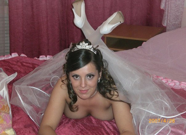 Candid photo of attractive bride with curly hair 3 photo