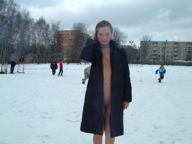 Football cheerleader stripped at the playground in the winter 3 photo