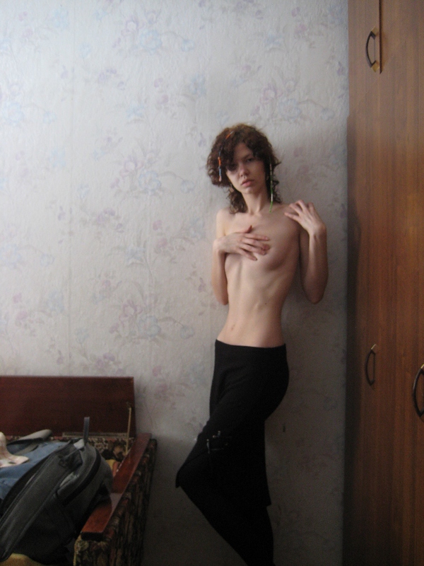 Skinny bitch with beautiful breasts undressed 3 photo