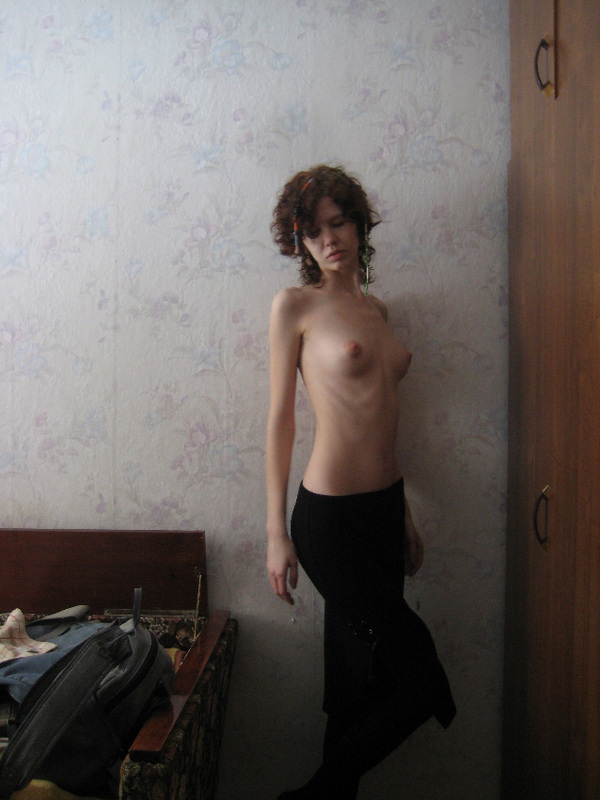 Skinny bitch with beautiful breasts undressed 4 photo