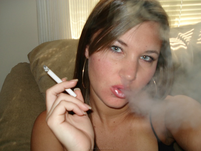 Wet whore with cigarette in a short skirt 3 photo