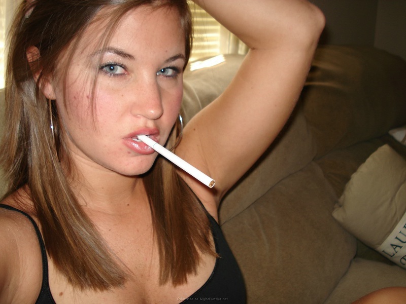 Wet whore with cigarette in a short skirt 4 photo