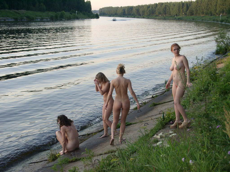 Four naked girlfriends having fun on nature with alcohol and smoking 3 photo